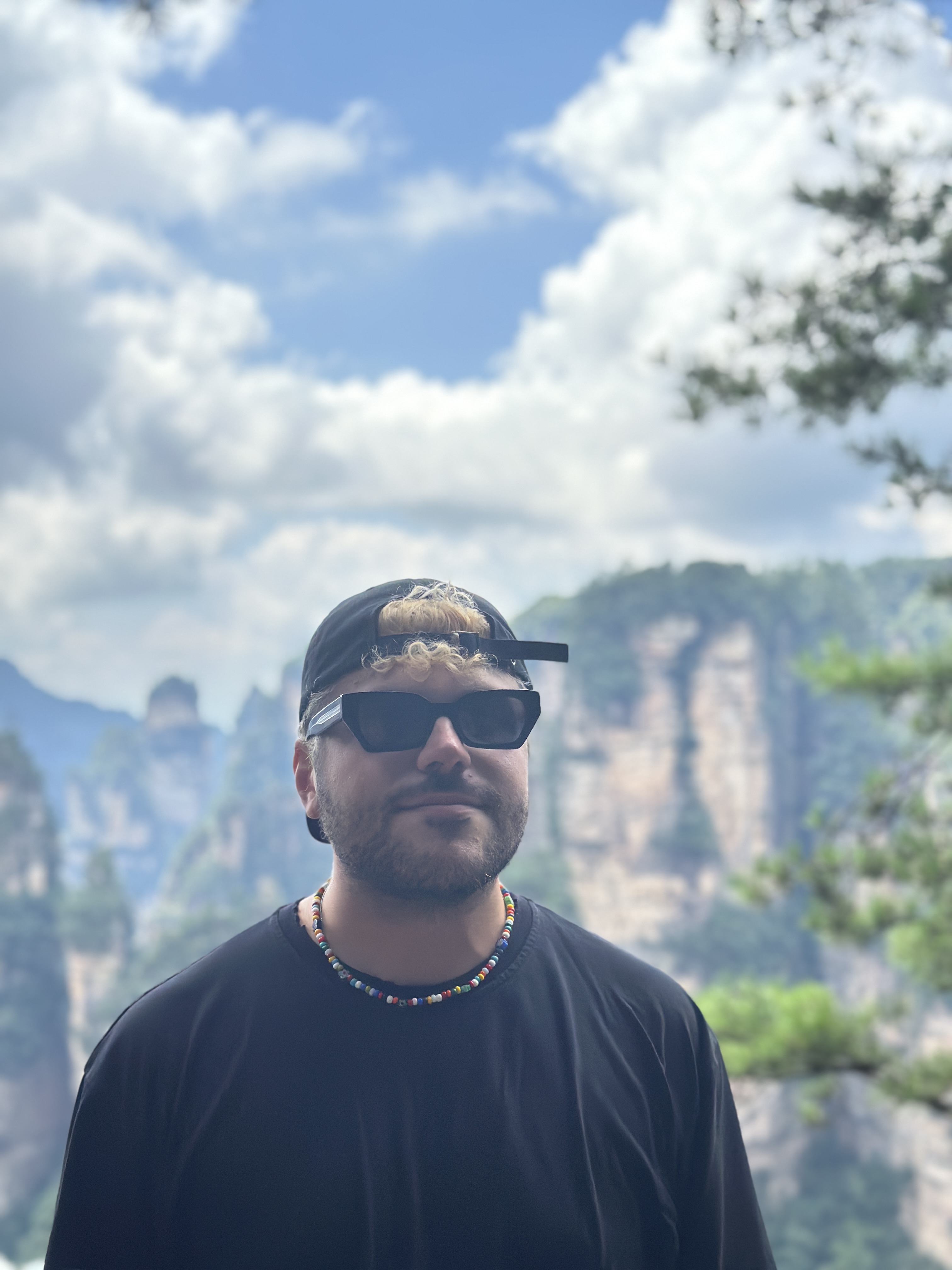 Francesco Mossali outdoors, wearing sunglasses